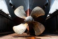 Close-up of large metal ship propeller in dry dock Royalty Free Stock Photo