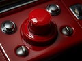 Close-up of a large red button as part of a control panel. Royalty Free Stock Photo