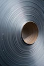 Close-up of a large roll of metallic sheet showcasing its smooth surface Royalty Free Stock Photo
