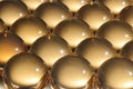 Close-up large shiny balls lie next to each other