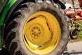 Close-up of a large wheel of a tractor with tire Royalty Free Stock Photo