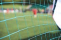 Close-up lattice of soccer goal gate on a football field