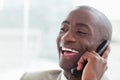 Close up of a laughing businessman on the phone Royalty Free Stock Photo