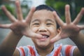 Close up laughing face of asian children playing with happiness emotion Royalty Free Stock Photo