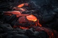 close-up of lava flowing from the vent and pooling on the ground