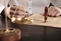 Close up lawyer businessman working or reading lawbook in office workplace.