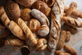 close up lay flat of breads scattered on a white work surface , shot from above even daylight ligting, strong focus good detail