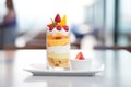 close-up of layered fruit parfait in glass