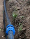 Close-up of laying pipes in the ground for future close