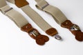 Close-up on Leather details of suspenders on white background. Royalty Free Stock Photo