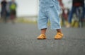 close up leg of infant baby learning to walking first step on pathway Royalty Free Stock Photo