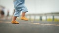 close up leg of infant baby learning to walking first step on pathway Royalty Free Stock Photo