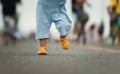 close up leg of infant baby learning to walking first step on pathway Royalty Free Stock Photo