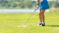 Close up legs golfer. Golfer sport course golf ball fairway Royalty Free Stock Photo