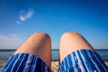 Mens legs on the beach Royalty Free Stock Photo