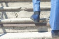 Close up legs shoes of young business man one person walking stepping going up the stairs in modern city, go up, success, grow up Royalty Free Stock Photo
