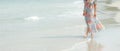 Close up legs. Summer Vacation. Lifestyle woman walking relax and happy on beach tropical outdoor in summer day Royalty Free Stock Photo