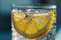 Close-up of lemon in glass of water, good morning habits. Generative AI Royalty Free Stock Photo