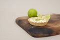 Close up of lemon pie on the wooden cutting board Royalty Free Stock Photo