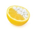 Close up of lemon and pills isolated