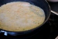 Close up of a lentils crepe in a pan