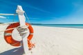 Close up of a life buoy in a tropical beach Royalty Free Stock Photo