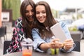 Close up lifestyle selfie portrait of pretty fresh young brunette best friends girls making selfie, having fun Royalty Free Stock Photo