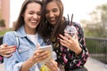 Close up lifestyle selfie portrait of pretty fresh young brunette best friends girls making selfie, having fun Royalty Free Stock Photo