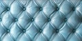 Close up of light blue leather upholster with diamond pattern connected by buttons Royalty Free Stock Photo