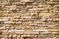 Light brown sand stone brick decorative on wall for background Royalty Free Stock Photo