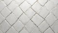 Close-up of light gray textured pattern with repeating geometric diamond shapes. Subtle monochrome design features subtle Royalty Free Stock Photo