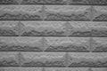 Closeup of light grey brickwork texture