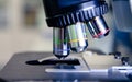 A close up light microscope for pharmaceutical bioscience research. Concept of science, laboratory and study of diseases Royalty Free Stock Photo