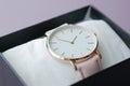 close up of light pink color women watch in a box Royalty Free Stock Photo