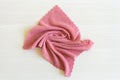 close up light pink microfiber texture on the table. Cleaning rag fluffy cloth. Household concept Royalty Free Stock Photo