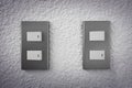 Close up of light switch with sunlight and shadow on white background, turn on and turn off, copy space, Royalty Free Stock Photo