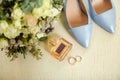 Wedding rings, shoes, Bridal bouquet Royalty Free Stock Photo