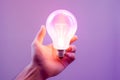 Close up a Lightbulb in a hand creative thinking concept new idea, innovation, brainstorming with copy space purple Generative AI Royalty Free Stock Photo