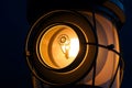 Close-up of lighthouse lantern room with illuminated lens Royalty Free Stock Photo