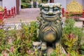 Close up of a lion statue in a park. Mythical creatures concept Royalty Free Stock Photo