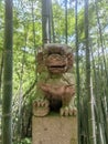 Close up of a lion stone statue in a park. Mythical creatures concept Royalty Free Stock Photo