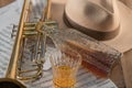 Close-up of liquor and trumpet with a hat Royalty Free Stock Photo