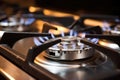 close up of lit natural gas stove burner Royalty Free Stock Photo