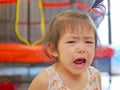 Close up of little Asian baby girl, 2 years old, crying Royalty Free Stock Photo