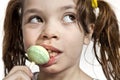 Close-up of little girl with a lollipop Royalty Free Stock Photo