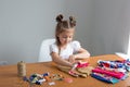 little girl sewing things by herself Royalty Free Stock Photo