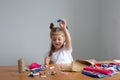 little girl sewing things by herself Royalty Free Stock Photo