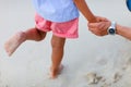 Close up of little girl standing at beach Royalty Free Stock Photo