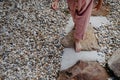 Close up of little girl walking barefoot near the forest cotage,weekend time during summer day. Royalty Free Stock Photo