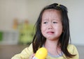 Close up Little kid girl crying with tearful on her face Royalty Free Stock Photo